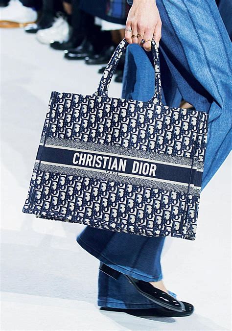 christian dior caba|christian dior purses on displays.